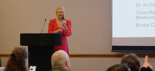 woman presenting at event