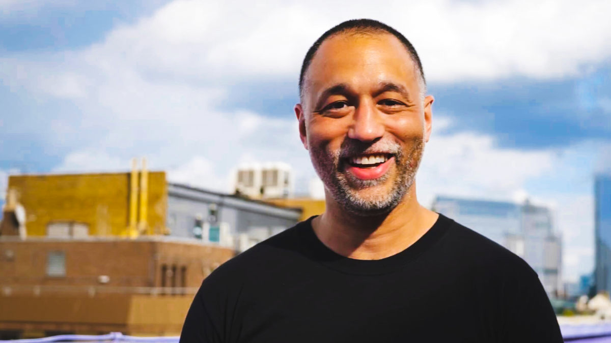 Simon Jones of Connect Well smiling on a sunny day in London